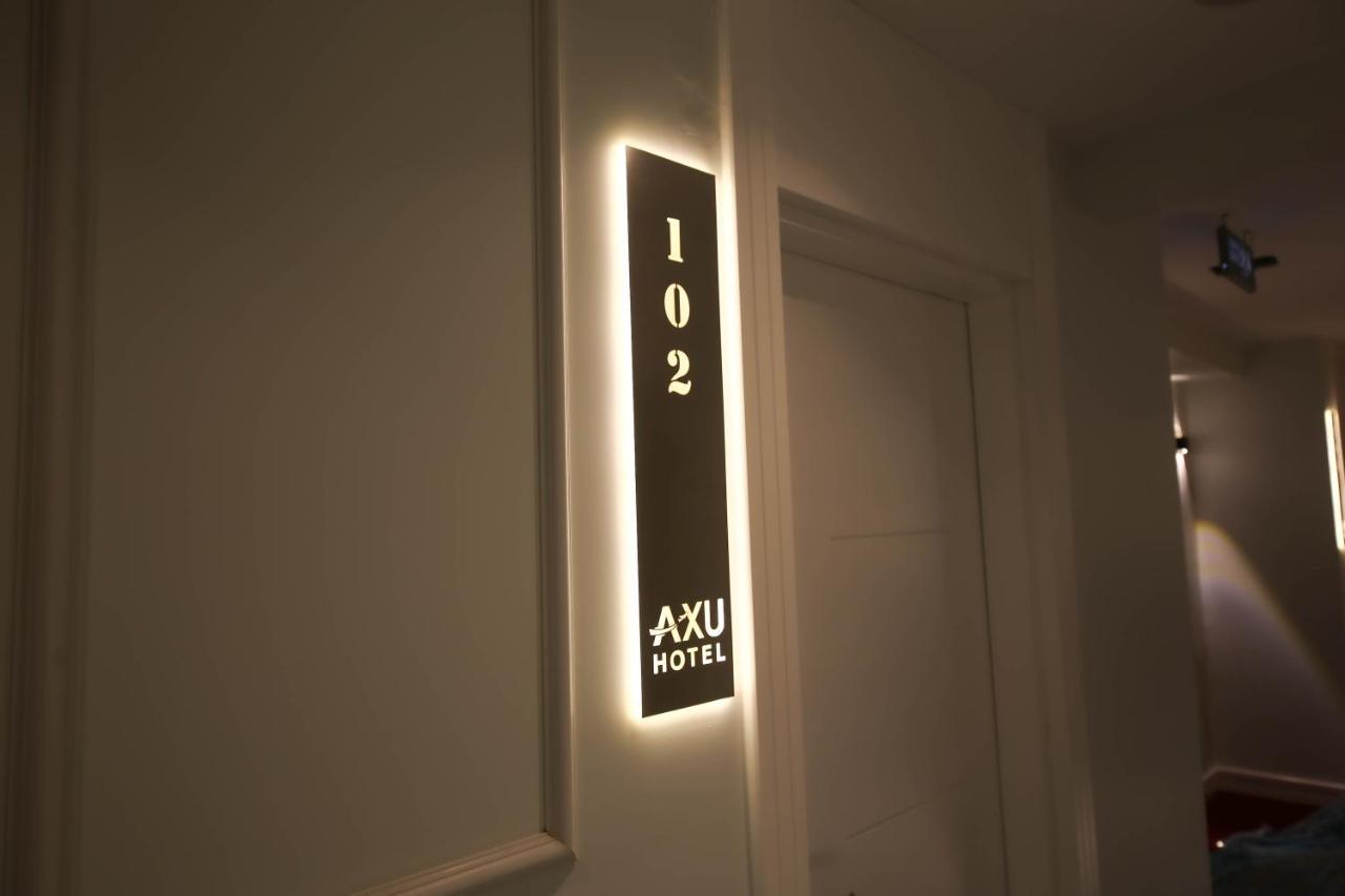 Axu Airport Hotel Arnavutkoy Eksteriør billede A room number sign